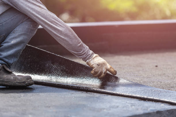 Professional Basement Waterproofing technician working in Churchville, NY
